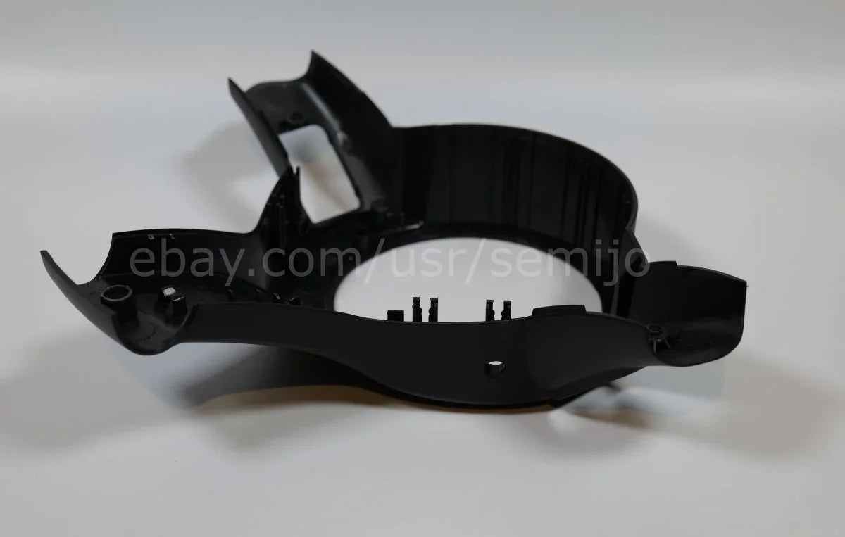 Black BMW F Series M Sport steering wheel back cover trim on white background
