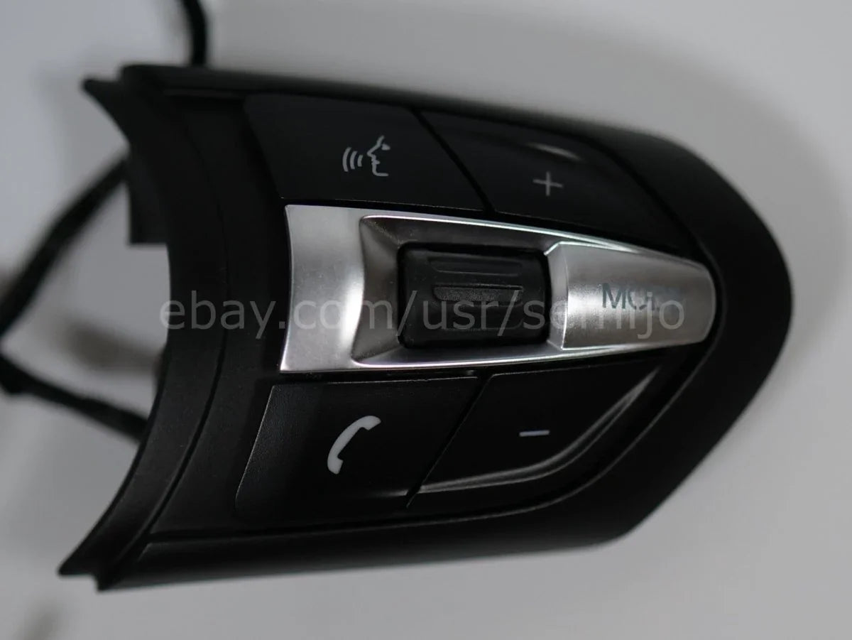 BMW F Series M Sport steering wheel control buttons with phone and volume icons