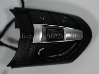 BMW F Series M Sport steering wheel control buttons with phone and volume icons