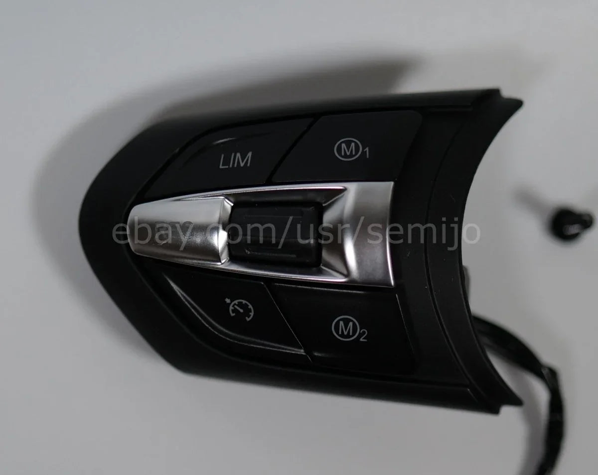 BMW F Series M Sport steering wheel button control module with black and silver trim