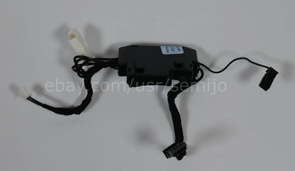 BMW F Series steering wheel control module with connectors on a plain background
