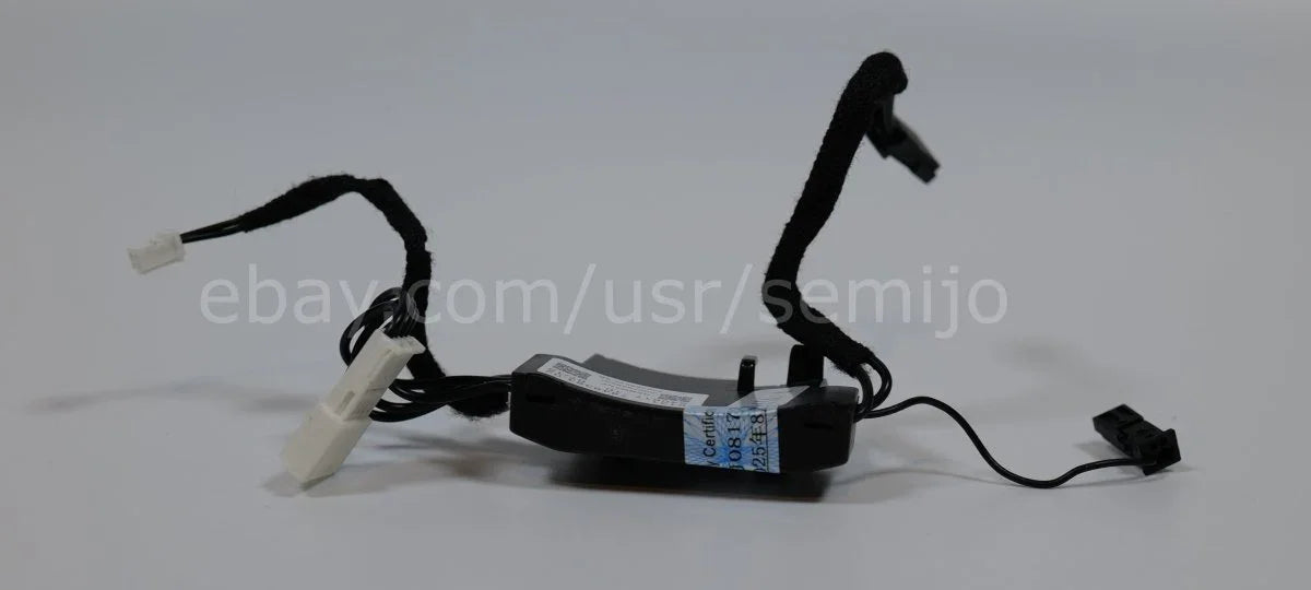 BMW F Series steering wheel control module with vibration and heat connectors on white background