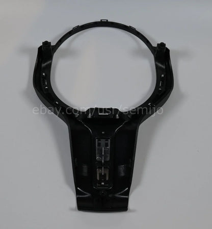 Steering wheel front cover trim for BMW F Series M Sport, black plastic, with central hole.