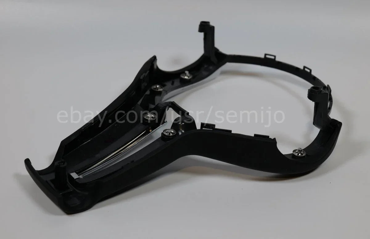 Black steering wheel front cover trim for BMW F Series M Sport, shown on a plain background
