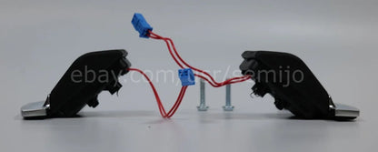 BMW F Series M Sport steering wheel paddle shifters with wiring and screws on white background