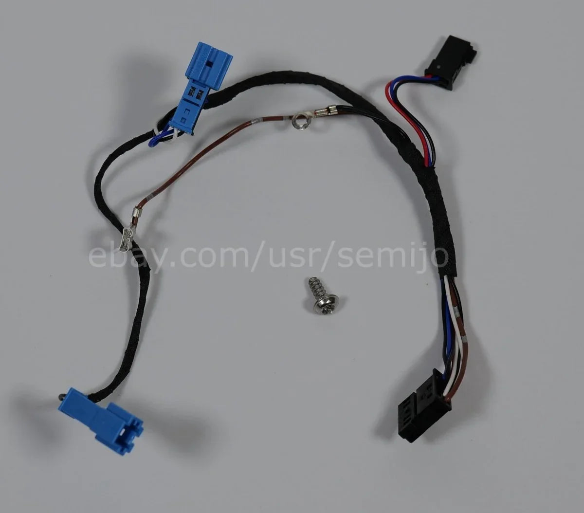BMW F Series steering wheel wiring harness with blue connectors and installation screw