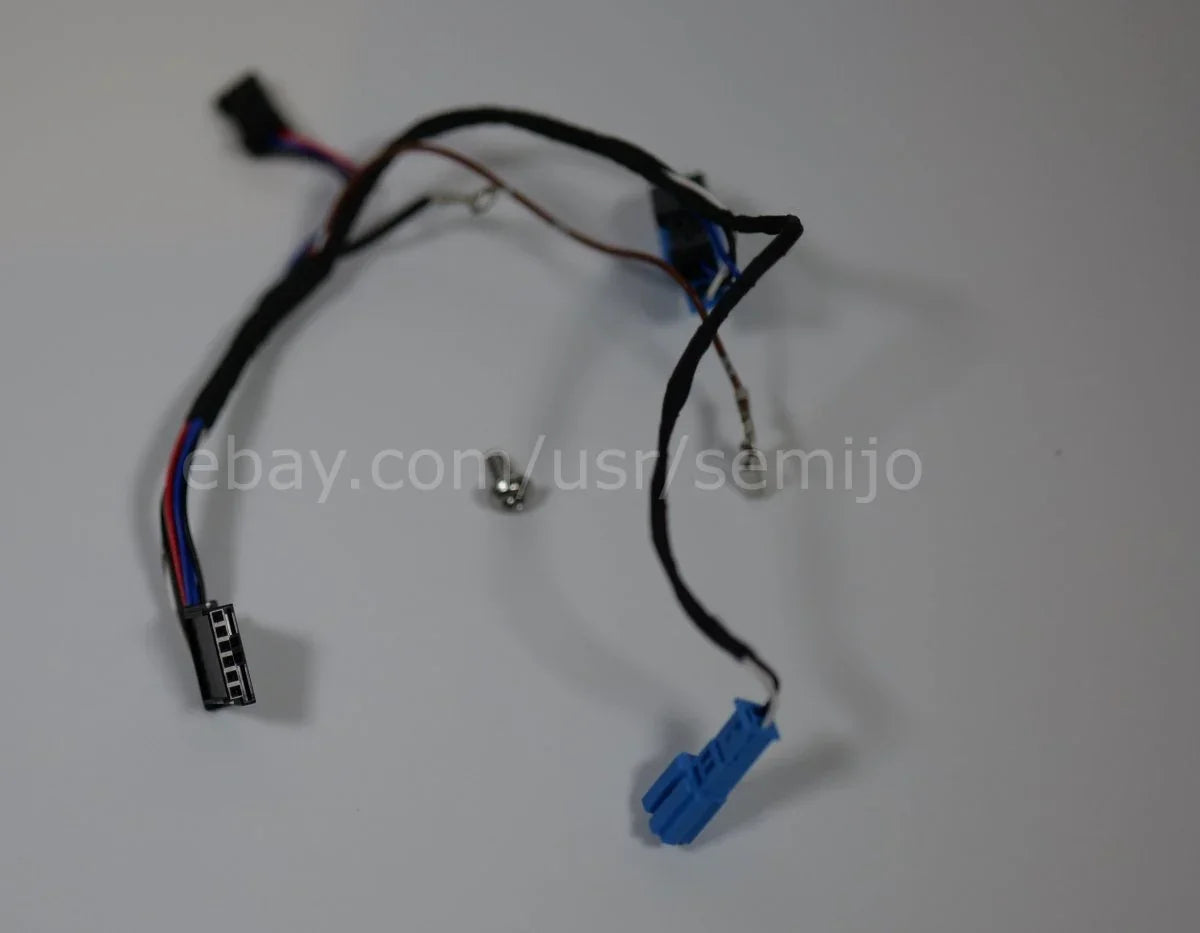 BMW F Series steering wheel wiring harness with connectors and screws on white background