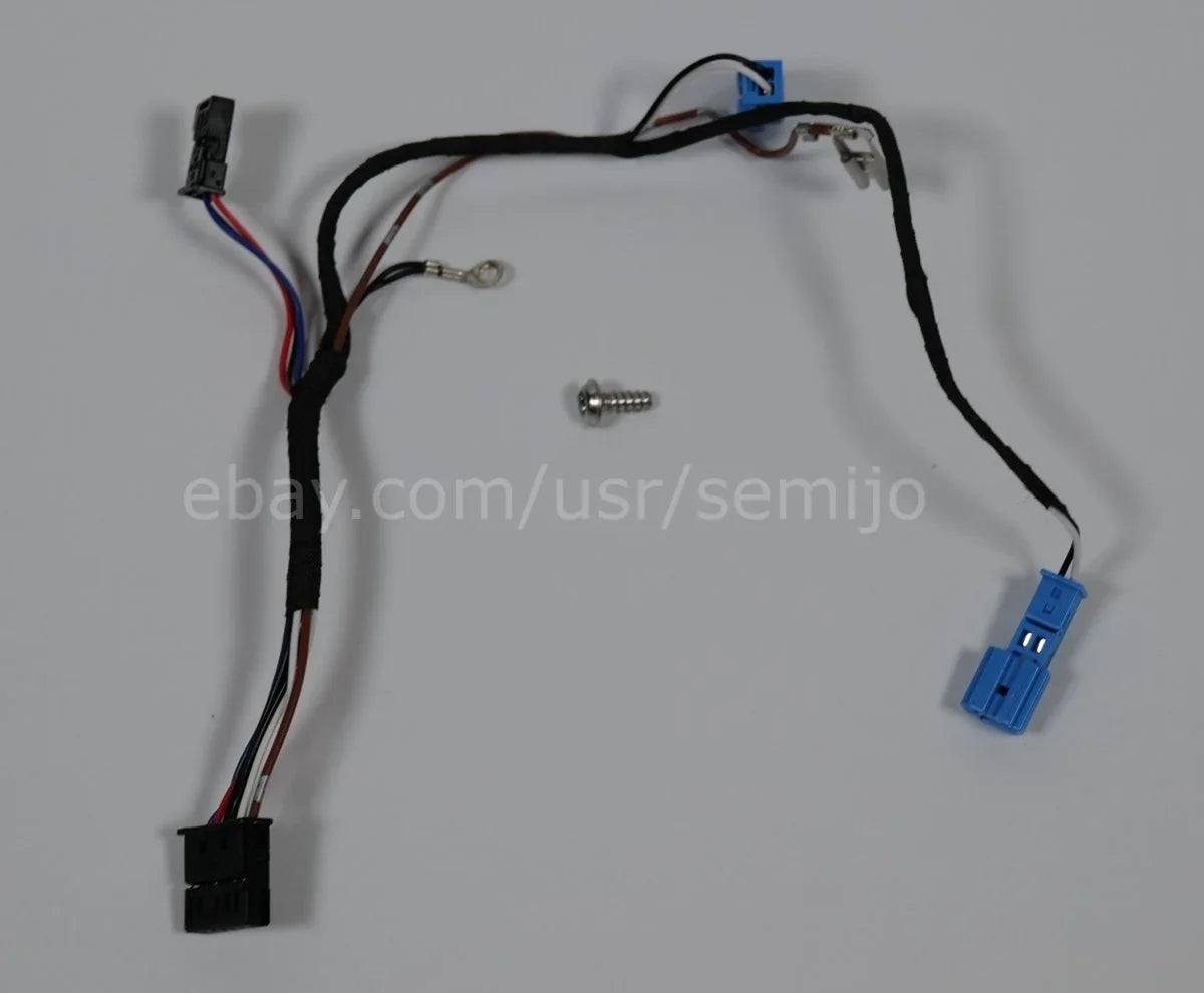 BMW F Series steering wheel wiring harness cable with connectors and screw on grey background
