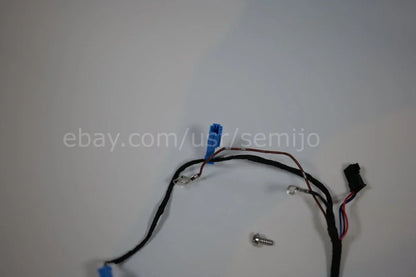 BMW F Series steering wheel wiring harness with connectors and a mounting screw