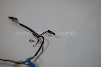 BMW F Series steering wheel wiring cable connectors with mounting screw on white background